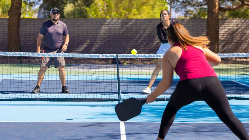 friends playing pickleball