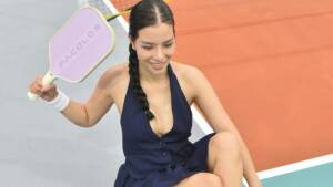 woman with a pickleball paddle